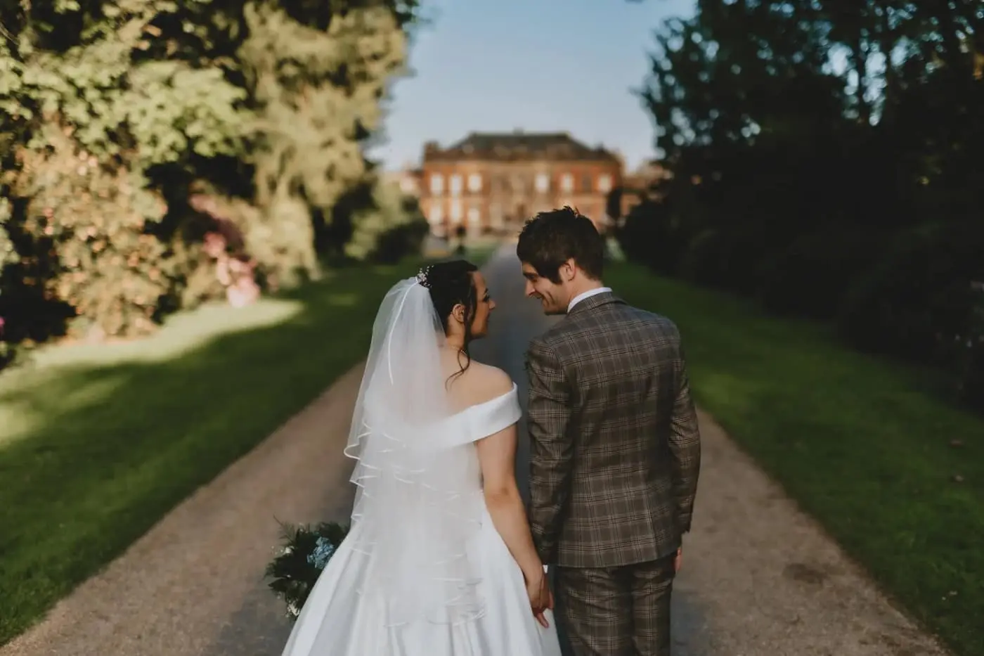 Kara & Jonny on their wedding day, photographed by Nick and Nic